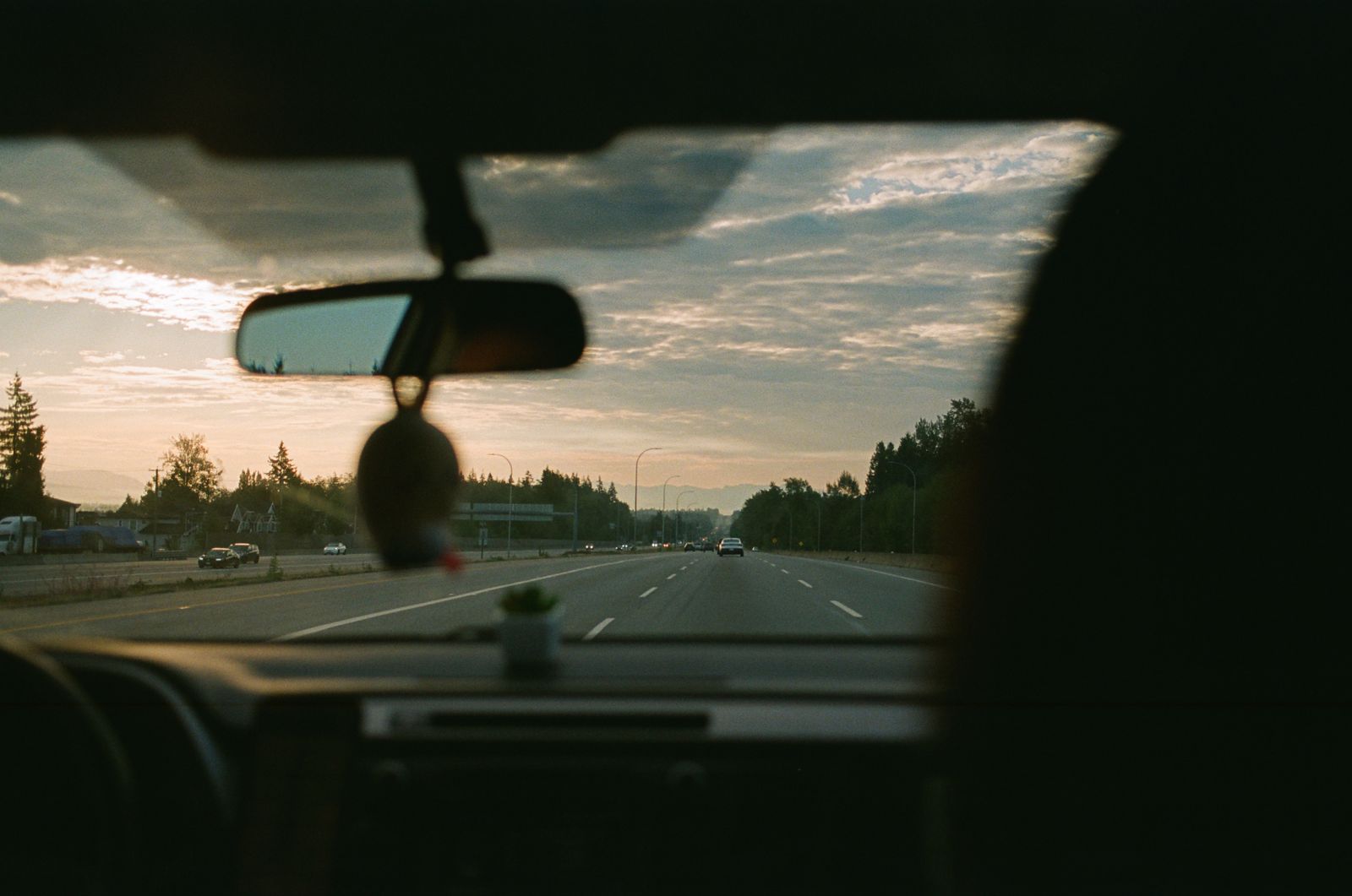 Car on the road at sunset